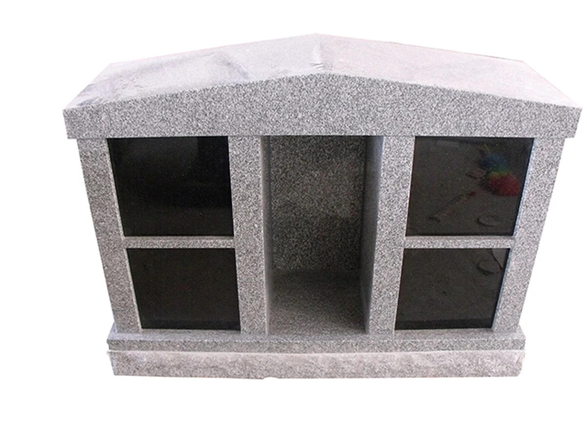 Four-niche family columbarium with black granite door panels